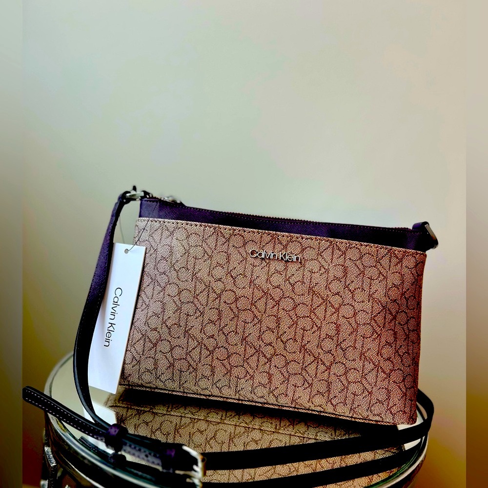 NWT!!! Calvin Klein Logo Crossbody Purse in this Almond and Plum color.